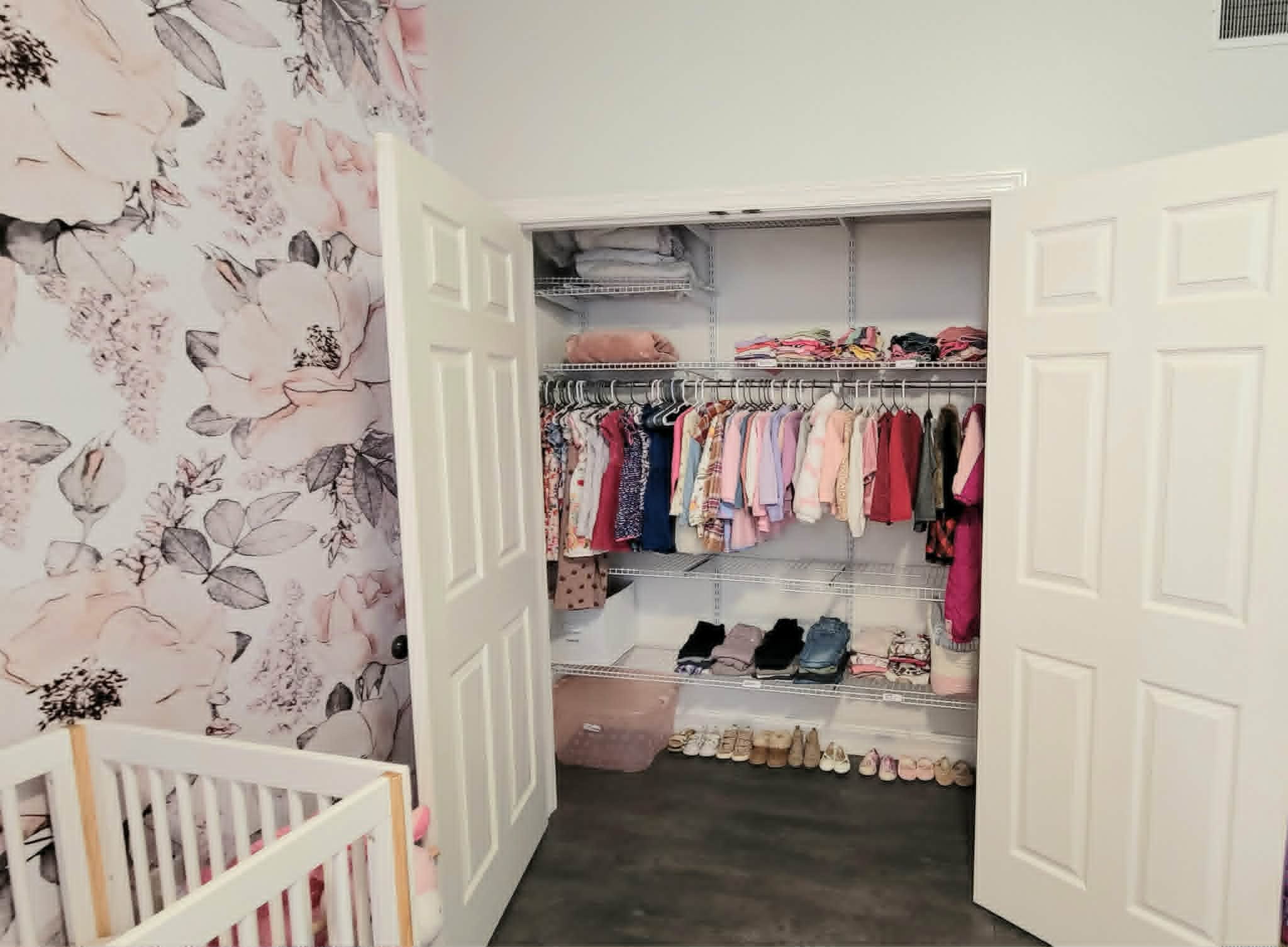 A neatly organized nursery closet