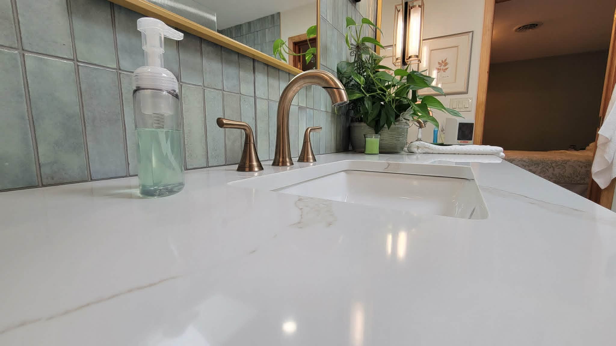 A clean bathroom vanity and countertop